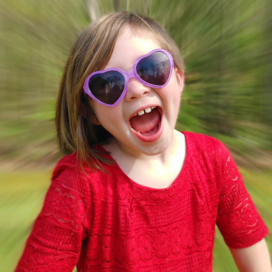 Child wearing Just A Shade Smaller Heart sunglasses