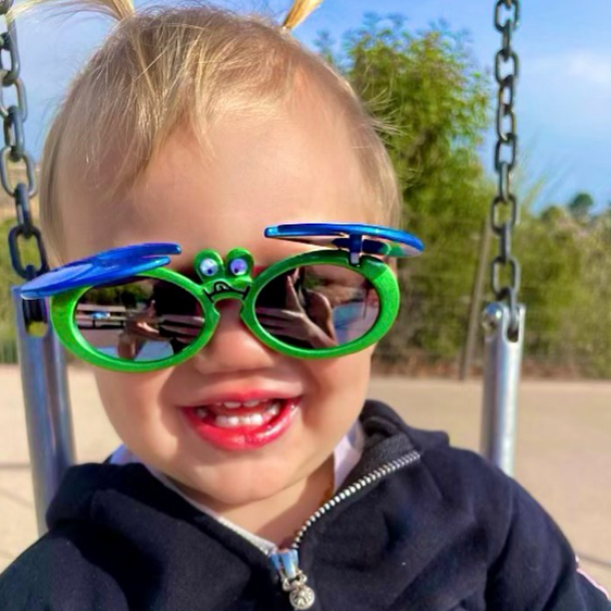 Toddler wearing Just A Shade Smaller Crabby sunglasses