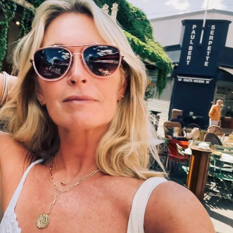 Model wearing Red Carpet Coral polarized pink aviator sunglasses